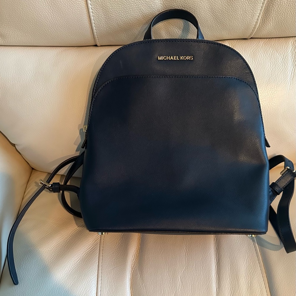 Gently used Michael Kors backpack